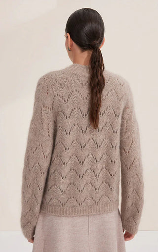 Camel openwork knit sweater from back, sequin detail on diamond pattern