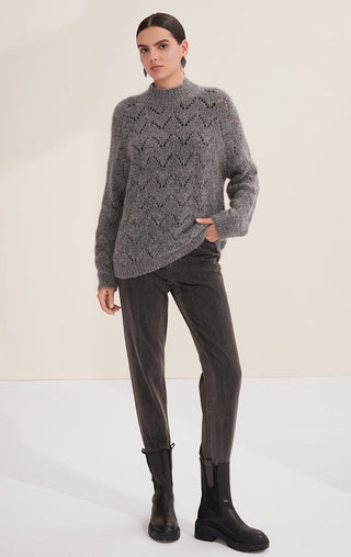 Gray-blue openwork knit sweater with sequined diamond pattern and ribbed crew neck