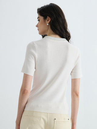 Ivory knit ribbed V-neck top, slim-fit, short sleeves—back view