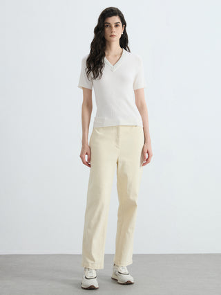 Ivory white fitted V-neck ribbed knit top with short sleeves