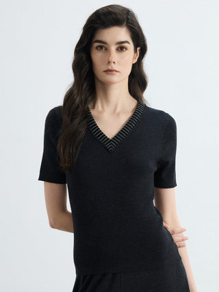 Black slim-fit V-neck ribbed knit top with short sleeves and textured knit finish