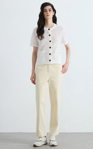 Ivory white short-sleeve knit cardigan with button front and patch pockets
