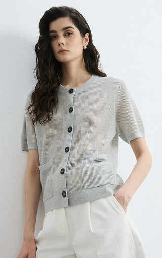 Gray sheer knit cardigan front view with dark buttons and patch chest pocket