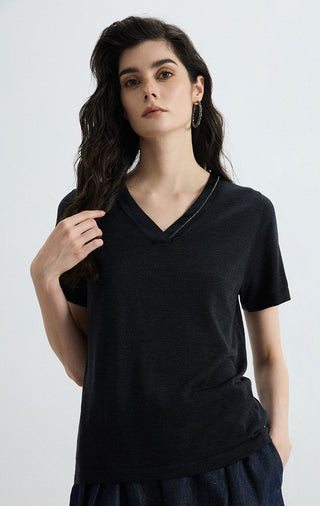 Black wool-silk blend v-neck knit tee with short sleeves, draped fit