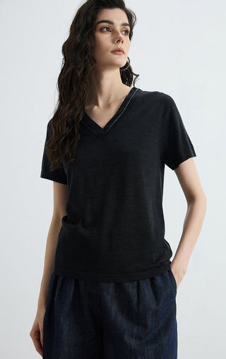 Black v-neck knit tee with short sleeves, three-quarter view