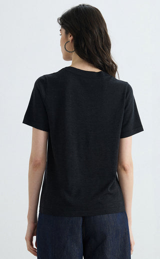 Black knit tee back view, short sleeves and straight hem