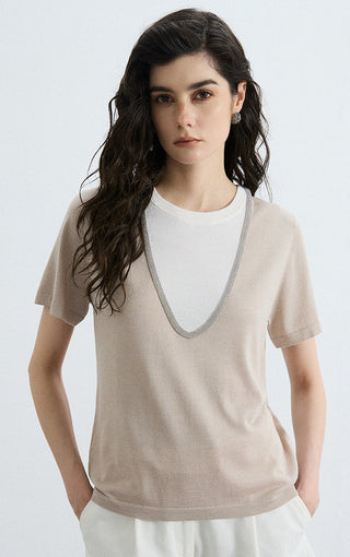Beige layered knit tee with contrast V-neck trim over white crew neckline