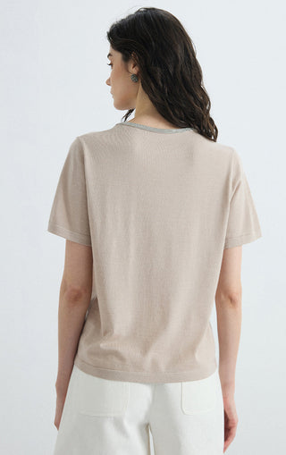 Beige layered knit tee, back view, short sleeves and contrast V-neck trim