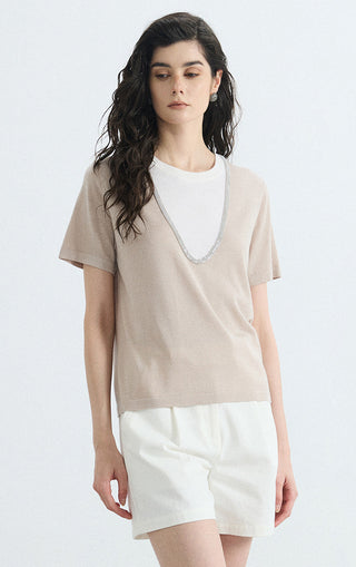 Beige layered knit tee front view, contrast V-neck trim and white inner neckline