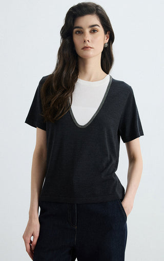 Black layered knit tee with contrast V-neck trim over white crew neckline
