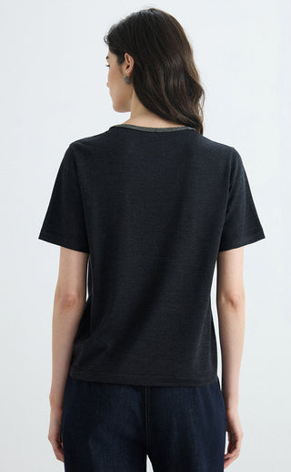 Black layered knit tee back view, short sleeves and contrast V-neck trim