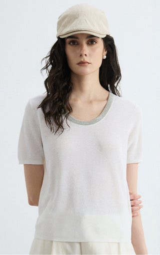 Ivory knit top with silver-trim round neckline and short sleeves