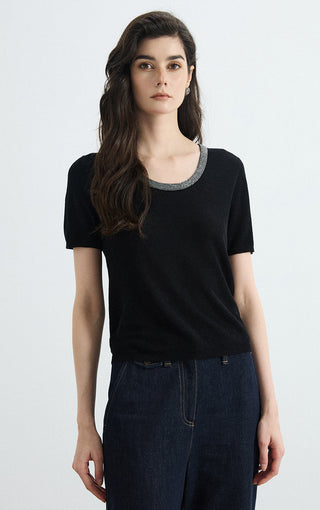 Black linen-silk knit top with silver-trim crew neck, short sleeve profile