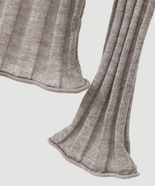 Taupe ribbed turtleneck knit top sleeve and hem detail with knit cuff
