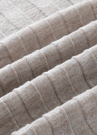 Light grey ribbed knit texture close-up with vertical stitch lines