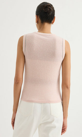 Back view of light pink sleeveless knit top with contrast trim at neckline