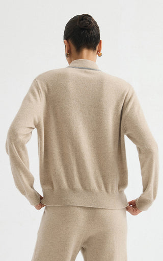 Camel cashmere zip-front knit jacket back view with ribbed waistband