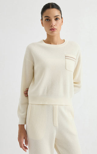 Ivory wool ribbed crewneck sweater with chest pocket and striped trim at pocket