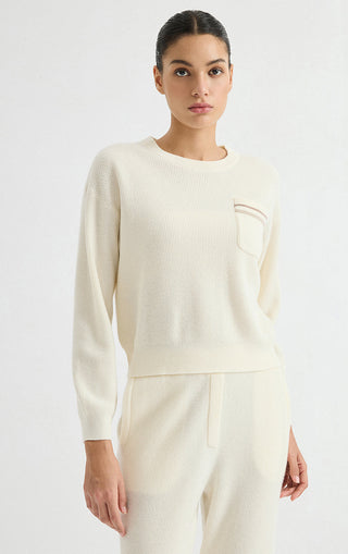 Ivory wool ribbed crewneck sweater with long sleeves and chest pocket with striped trim
