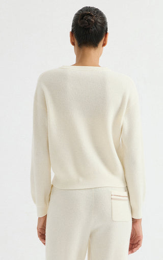 Ivory wool ribbed crewneck sweater, back view with ribbed hem and cuffs