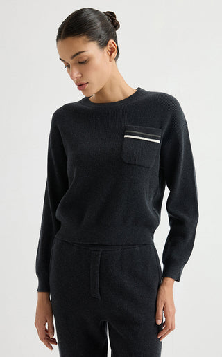 Black wool ribbed crewneck sweater with long sleeves and chest pocket with striped trim