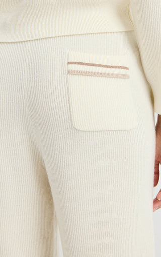 Ivory wool ribbed knit jogger pants with side patch pocket and striped accent