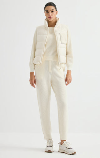 Ivory wool ribbed knit jogger pants with elastic waist and cuffed ankle hems