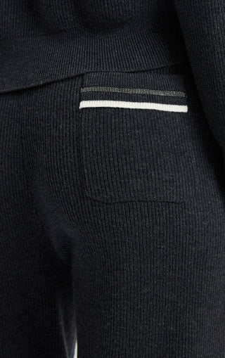 Dark wool ribbed knit jogger pants with striped waistband label detail