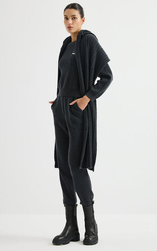 Dark wool ribbed knit jogger pants with elastic waist and tapered leg shape