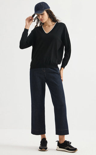 Black wool fine-knit V-neck sweater with long sleeves and relaxed fit