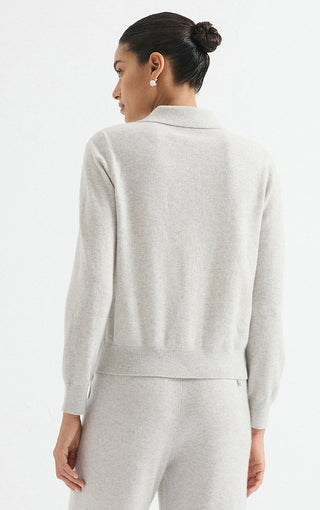 Light grey cardigan back view with long sleeves and straight hem