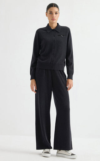 Graphite grey cashmere collared cardigan worn with matching wide-leg pants