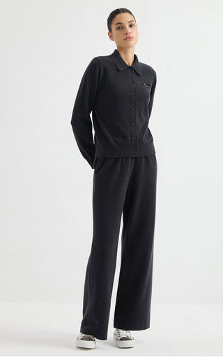 Graphite grey cashmere wide-leg knit pants styled with a relaxed drape