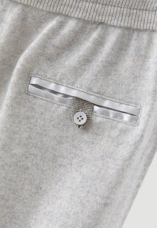 Light grey cashmere wide-leg knit pants detail: button closure at the front waistband