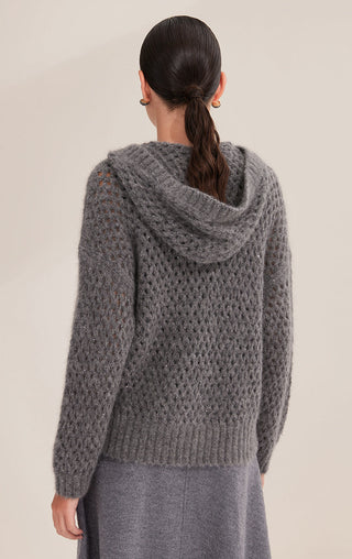 Back view of gray openwork zip cardigan with ribbed hem