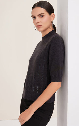 Black cashmere mock neck top, side view with vertical sequin stripe accents