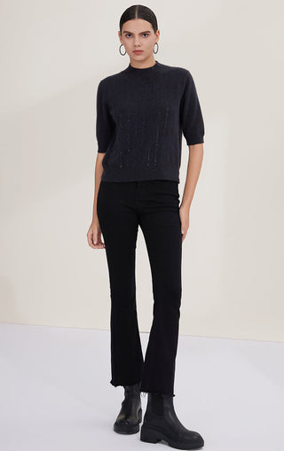 Black cashmere mock neck top with sequin striped pattern and short sleeves