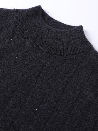 Black cashmere mock neck close-up with small sequin accents