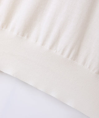 Off-white wool pullover hem with soft ribbing detail