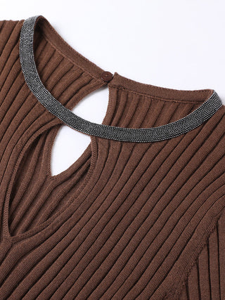 Neckline close-up: brown ribbed knit sweater with V cutout and sparkly contrast collar trim