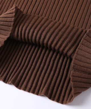 Brown ribbed knit cuff and hem detail on long-sleeve sweater