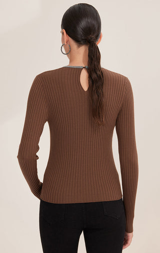 Brown ribbed knit sweater from back view, V cutout at upper back with contrast trim