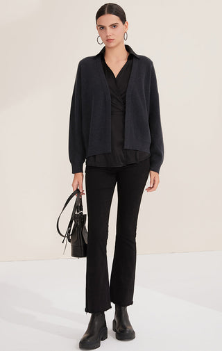 Black wool cardigan with open front and V-neck over silk vest, side view