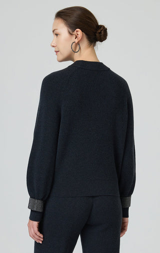 Graphite gray wool sweater back view with ribbed hem and beaded chain cuff