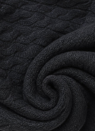 Charcoal cable knit wool polo sweater fabric closeup
