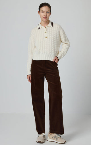Cream wool cable-knit polo sweater with striped collar and gold buttons