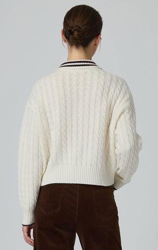 Cream cable-knit wool polo sweater, back view, ribbed hem and cuffs