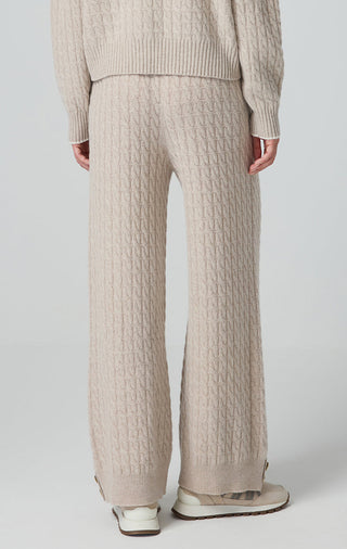 Camel wool cable-knit pants, straight wide legs with ribbed hem cuffs.