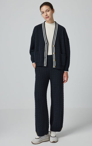 Graphite gray cable knit cardigan with contrast stripes, patch pockets, and gold buttons