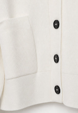 White wool cardigan button front with three black buttons on placket